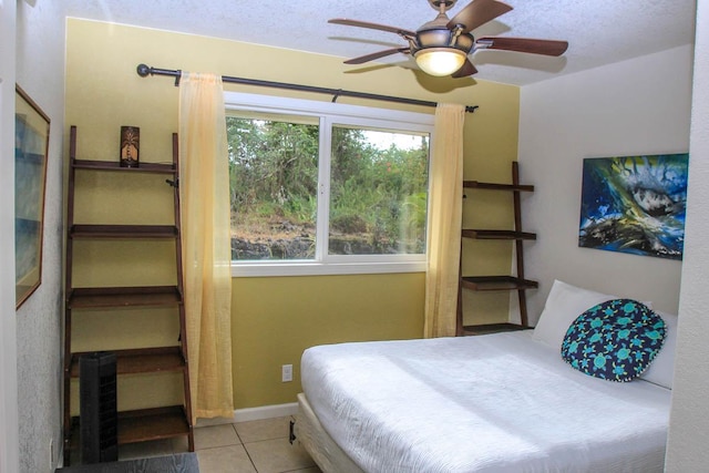 16-380 Melekule St, Kurtistown, HI 96760 - tiled bedroom with ceiling fan