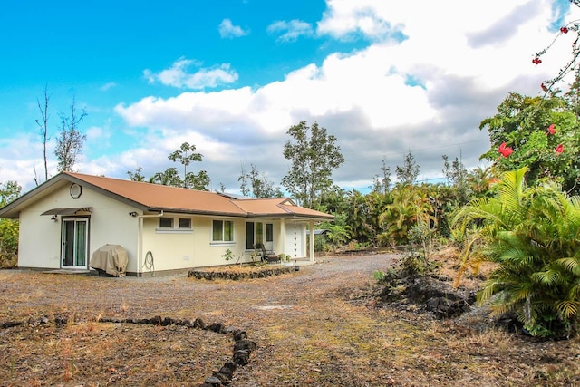 16-380 Melekule St, Kurtistown, HI 96760 - back of house featuring stucco siding