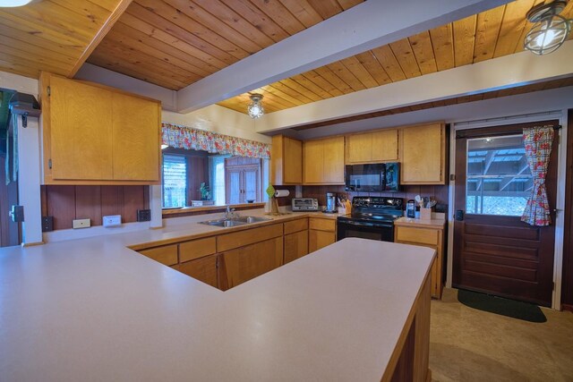 1559 Kilikina St, Hilo, HI 96720 - kitchen with black appliances, a sink, light countertops, wood ceiling with exposed beams, and a peninsula