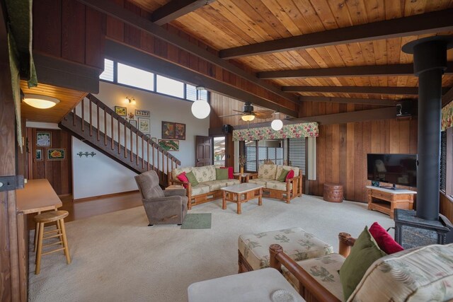 1559 Kilikina St, Hilo, HI 96720 - living room with wooden ceiling, stairway, wooden walls, carpet flooring, and a ceiling fan