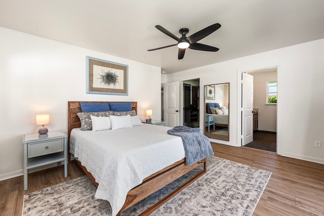 73-1060 Kuuleialoha Cir, Kailua-Kona, HI 96740 - bedroom with baseboards, wood finished floors, and a ceiling fan