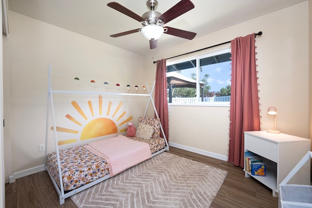 73-1060 Kuuleialoha Cir, Kailua-Kona, HI 96740 - bedroom with wood finished floors, baseboards, and a ceiling fan
