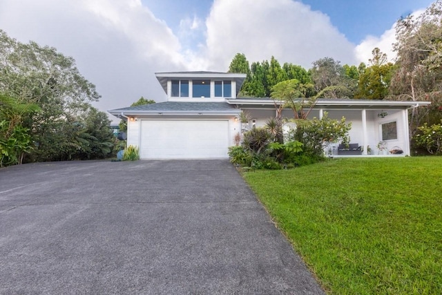 64-740 Punakea Pl, Kamuela, HI 96743 - view of front facade featuring asphalt driveway, a front yard, and a garage