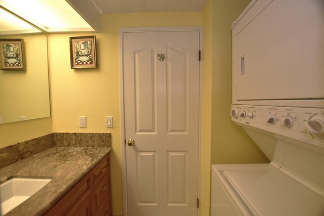 68-3840 Lua Kula St Unit D200, Waikoloa, HI 96738 - laundry area with estacked washer and dryer and cabinet space