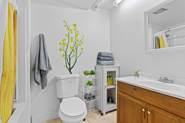 400 Hualani St Unit 1205, Hilo, HI 96720 - bathroom featuring vanity, toilet, tile patterned floors, and shower / tub combo with curtain