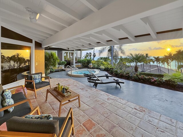 78-6825 Keaupuni St, Kailua-Kona, HI 96740 - patio terrace at dusk with a patio area, a pool, french doors, and an outdoor living space