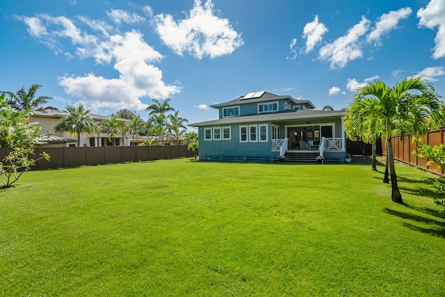2344 Halalii Pl, Koloa, HI 96756 - rear view of property with a ceiling fan, covered porch, and board and batten siding