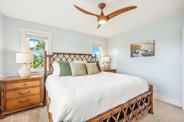 2344 Halalii Pl, Koloa, HI 96756 - bedroom with light carpet, multiple windows, and ceiling fan