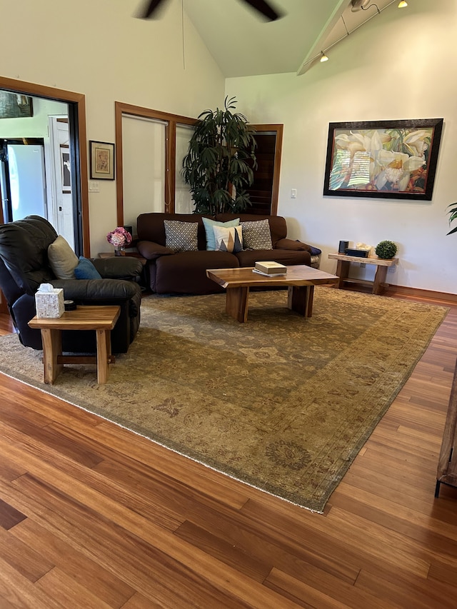 6670-G Kahuna Rd Unit 2, Kapaa, HI 96746 - living area featuring wood finished floors, ceiling fan, and lofted ceiling