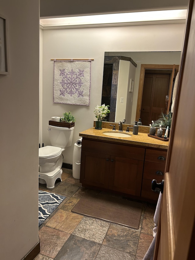6670-G Kahuna Rd Unit 2, Kapaa, HI 96746 - bathroom with stone tile flooring and vanity