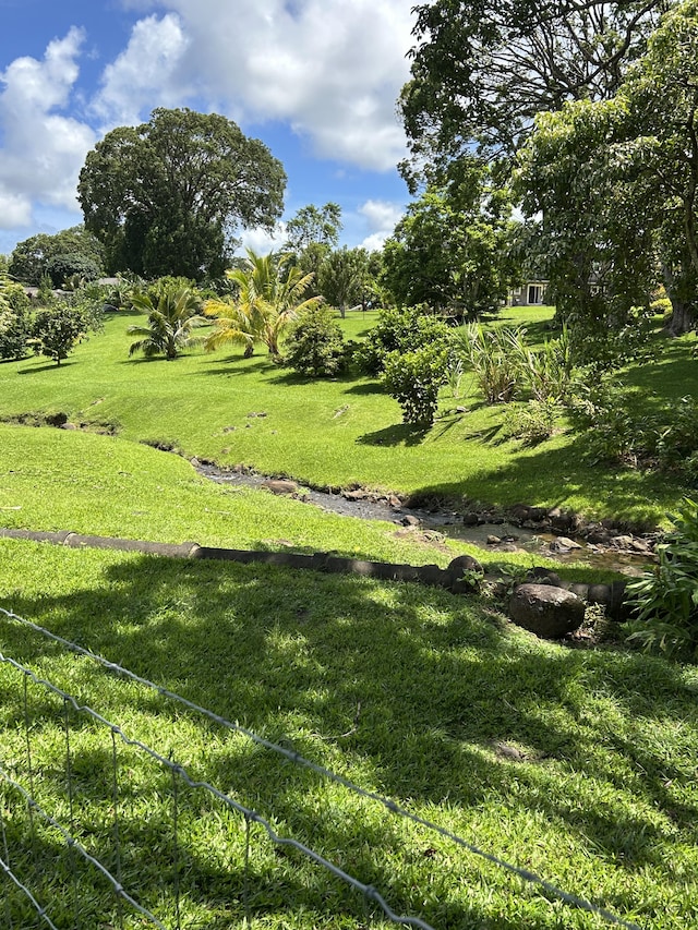 6670-G Kahuna Rd Unit 2, Kapaa, HI 96746 - view of property's community with a yard