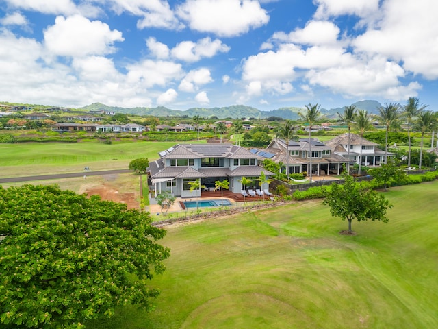 2739 Uluwehi St, Koloa, HI 96756 - aerial view of residential area with a mountainous background and a golf club