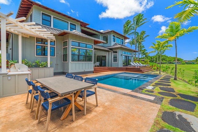2739 Uluwehi St, Koloa, HI 96756 - swimming pool featuring an outdoor kitchen, a patio, and outdoor dining area