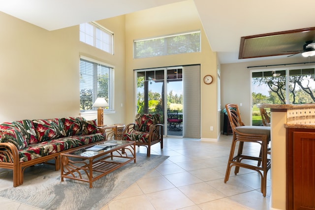 68-180 Waikoloa Beach Dr Unit J1, Waikoloa, HI 96738 - living room with light tile patterned flooring, a towering ceiling, and a ceiling fan