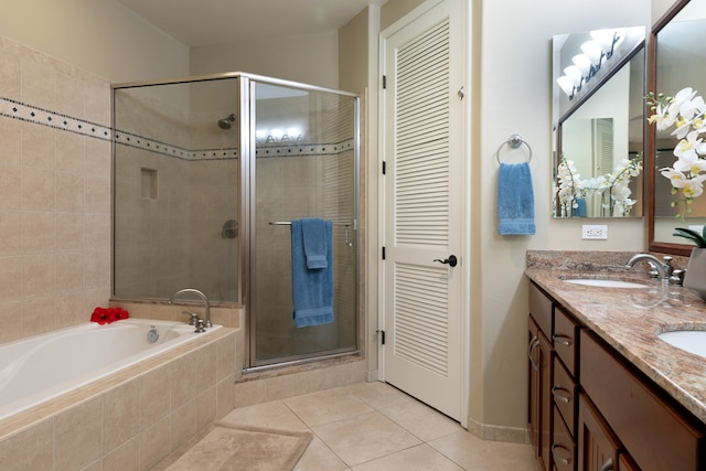68-180 Waikoloa Beach Dr Unit J1, Waikoloa, HI 96738 - full bathroom featuring a stall shower, double vanity, tile patterned floors, and a bath