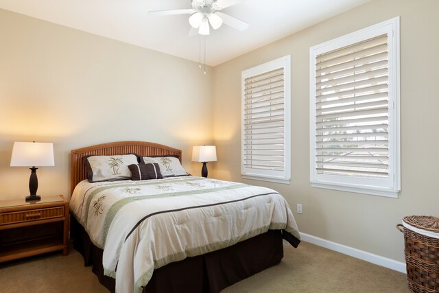 68-180 Waikoloa Beach Dr Unit J1, Waikoloa, HI 96738 - carpeted bedroom with baseboards and a ceiling fan