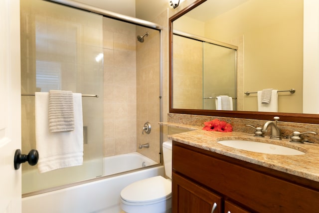 68-180 Waikoloa Beach Dr Unit J1, Waikoloa, HI 96738 - bathroom with vanity, shower / bath combination with glass door, and toilet