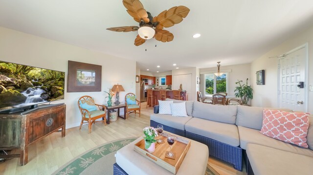 3780 Edward Rd Unit 5301, Princeville, HI 96722 - living area featuring light wood-type flooring, recessed lighting, a ceiling fan, and baseboards