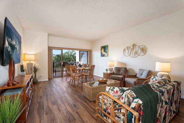 75-6040 Alii Dr Unit 504, Kailua-Kona, HI 96740 - living area with wood finished floors and baseboards