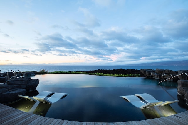 68-1021 Ke Kailani Dr, Kamuela, HI 96743 - view of swimming pool featuring a water view and a boat dock