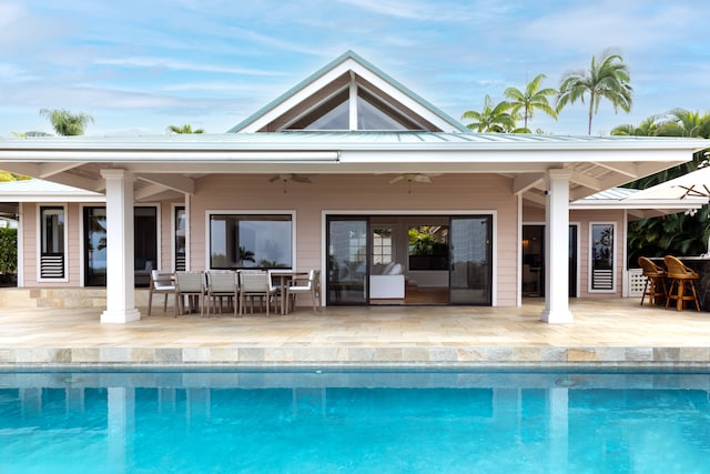 78-6846 Keaupuni St, Kailua-Kona, HI 96740 - rear view of house with ceiling fan, a patio, and an outdoor pool