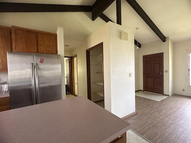 102 Puhili St, Hilo, HI 96720 - kitchen featuring freestanding refrigerator and brown cabinets
