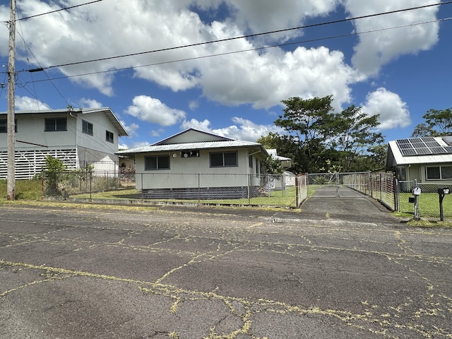 102 Puhili St, Hilo, HI 96720 - view of front of home with a gate and driveway