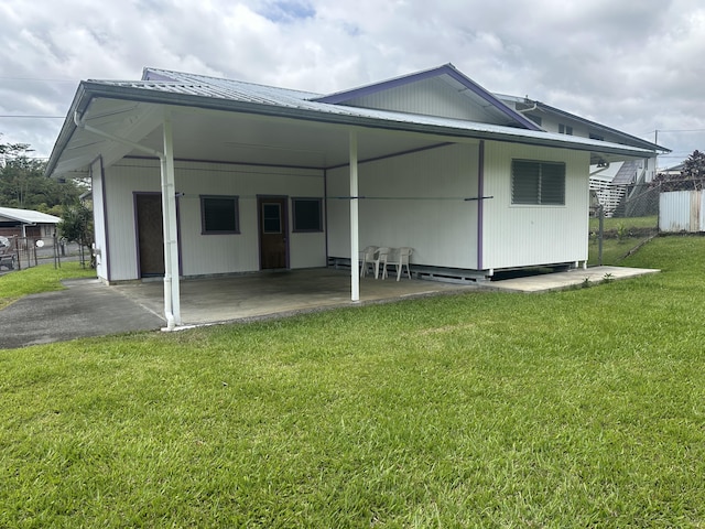 102 Puhili St, Hilo, HI 96720 - rear view of property with a carport and metal roof