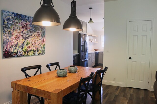 65-1235 Opelo Rd Unit 5, Kamuela, HI 96743 - dining room with dark wood-style flooring and baseboards