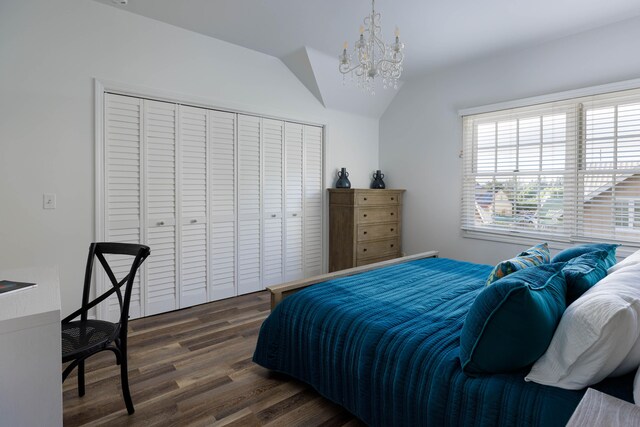 65-1235 Opelo Rd Unit 5, Kamuela, HI 96743 - bedroom with vaulted ceiling, a closet, dark wood-style flooring, and a chandelier