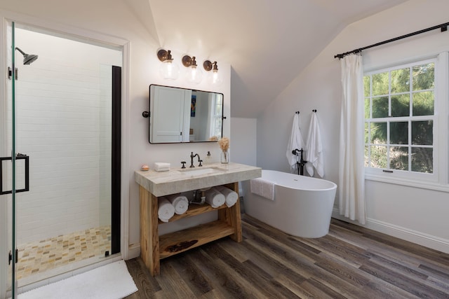 65-1235 Opelo Rd Unit 5, Kamuela, HI 96743 - bathroom with vaulted ceiling, a shower stall, wood finished floors, a freestanding bath, and a sink