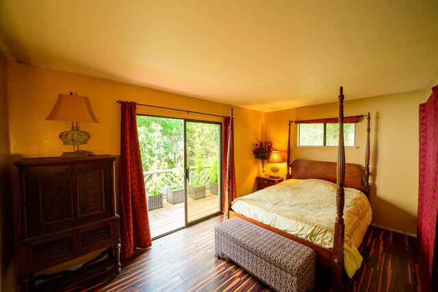 2239 Upper Kanaio Rd, Kula, HI 96790 - bedroom with access to outside, multiple windows, and wood finished floors