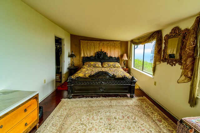 2239 Upper Kanaio Rd, Kula, HI 96790 - bedroom featuring dark wood-style flooring and baseboards