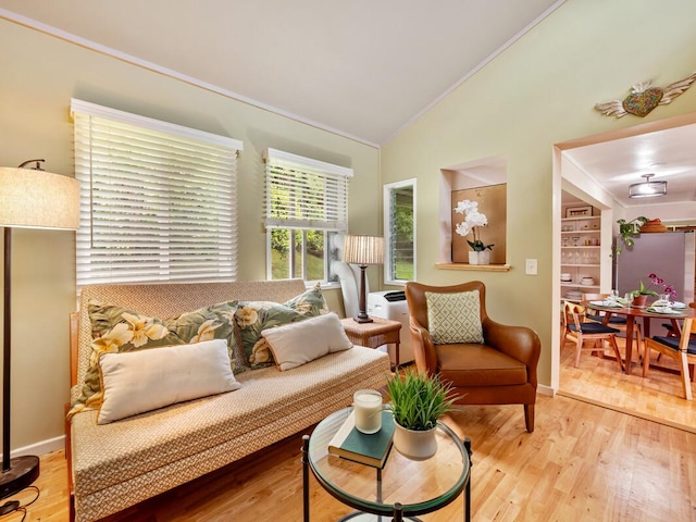 1174 Ainalako Rd, Hilo, HI 96720 - living room with vaulted ceiling, ornamental molding, and wood finished floors