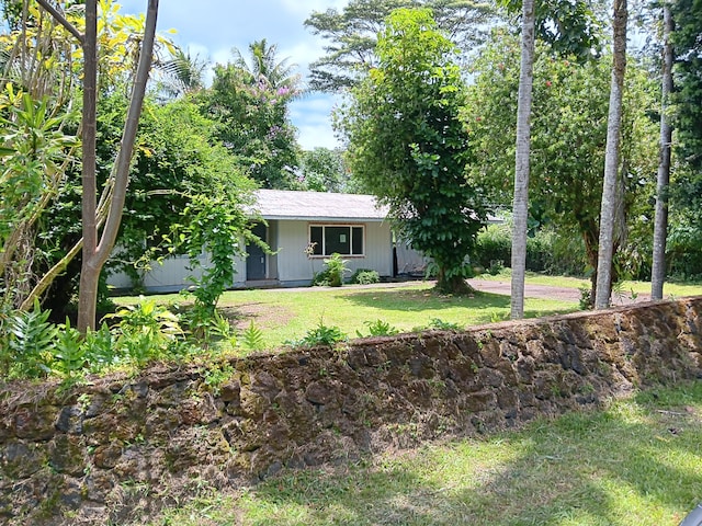 15-2713 Manalo St, Pahoa, HI 96778 - view of front of property with a front lawn