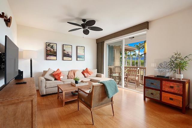 2611 Kiahuna Plantation Dr Unit 15G, Koloa, HI 96756 - living room with ceiling fan and light wood-style floors