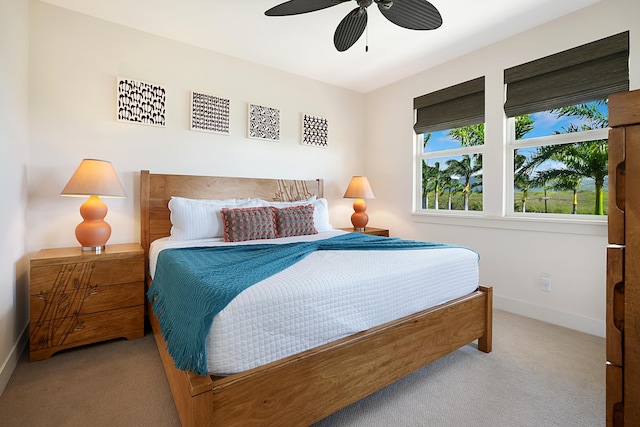 2611 Kiahuna Plantation Dr Unit 15G, Koloa, HI 96756 - bedroom featuring carpet floors, baseboards, and ceiling fan