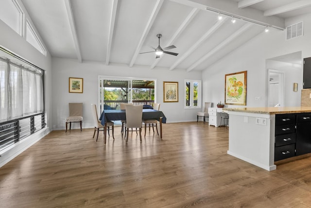 15-1988 1st Ave, Akala Keaau, HI 96749 - dining space with track lighting, ceiling fan, and wood finished floors