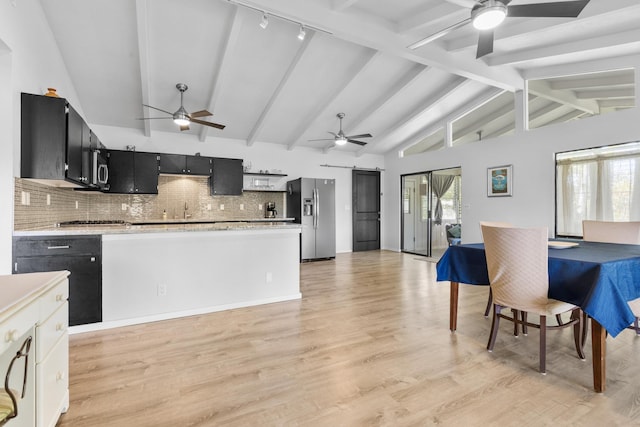 15-1988 1st Ave, Akala Keaau, HI 96749 - kitchen with stainless steel appliances, a ceiling fan, light countertops, dark cabinets, and light wood-style floors