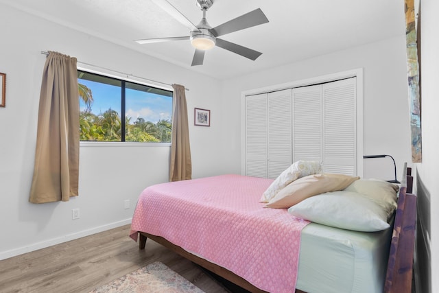 15-1988 1st Ave, Akala Keaau, HI 96749 - bedroom with wood finished floors, a closet, and ceiling fan