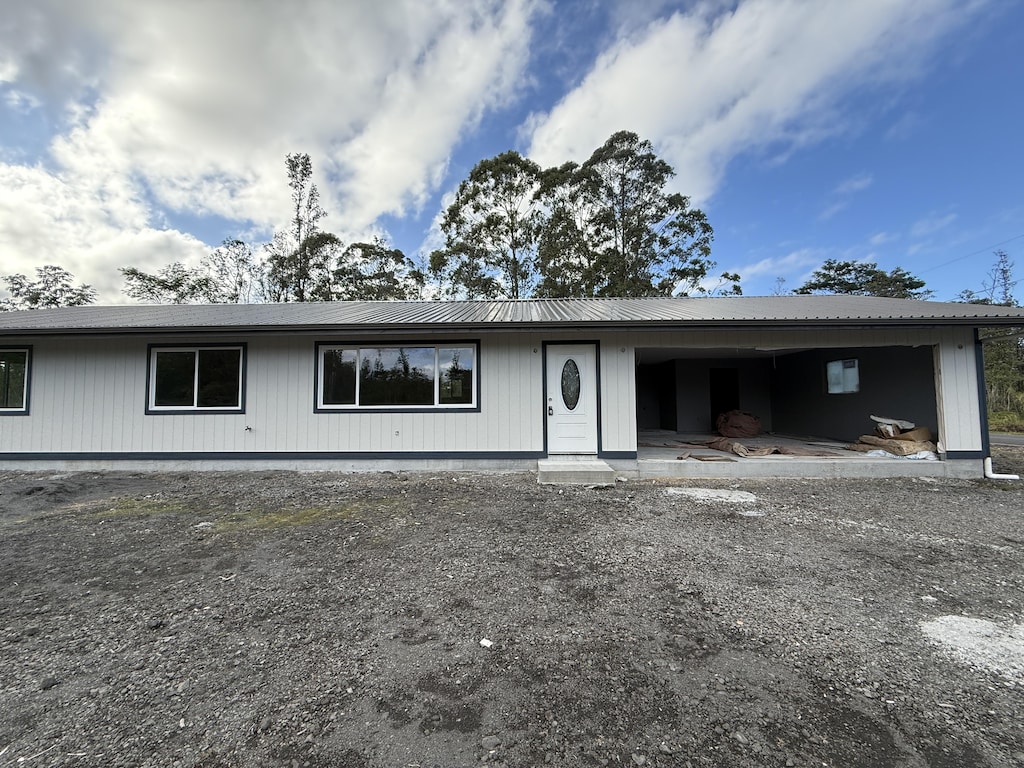 16-2052 Hibiscus Dr, Pahoa, HI 96778 - view of front facade with metal roof