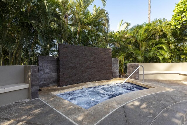 69-1010 Keana Pl Unit A104, Waikoloa, HI 96738 - view of pool with an in-ground hot tub and a patio