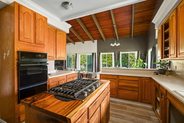 3968 Pai St, Kalaheo, HI 96741 - kitchen featuring oven, stainless steel gas stovetop, a warming drawer, wood ceiling with exposed beams, and plenty of natural light