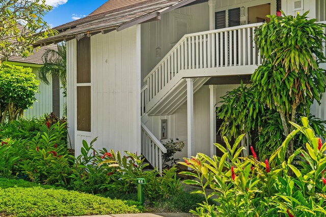 2253 Poipu Rd Unit 67, Koloa, HI 96756 - view of side of home featuring stairway