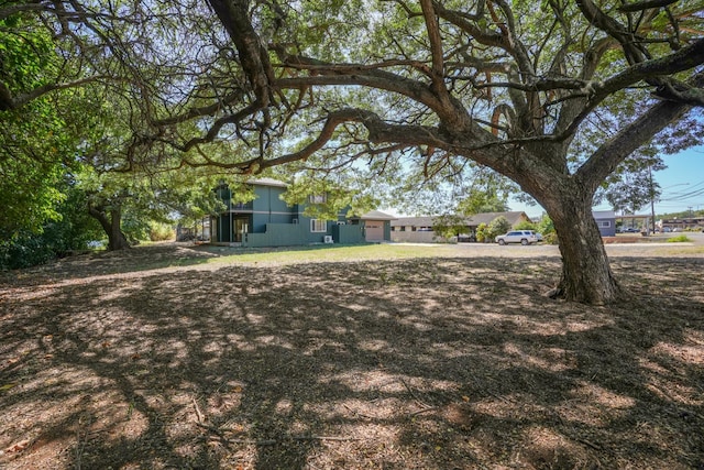 1-3580 Kaumualii Hwy, Hanapepe, HI 96716 - view of yard featuring an attached garage