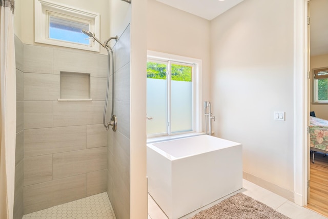 1-3580 Kaumualii Hwy, Hanapepe, HI 96716 - bathroom featuring tiled shower, ensuite bathroom, and tile patterned floors