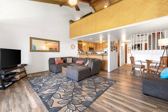 68-3840 Lua Kula St Unit G205, Waikoloa, HI 96738 - living room featuring a high ceiling, a ceiling fan, and wood finished floors