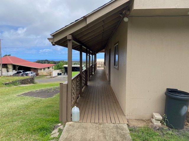 95-1214 Ohai Rd, Naalehu, HI 96772 - deck featuring a lawn