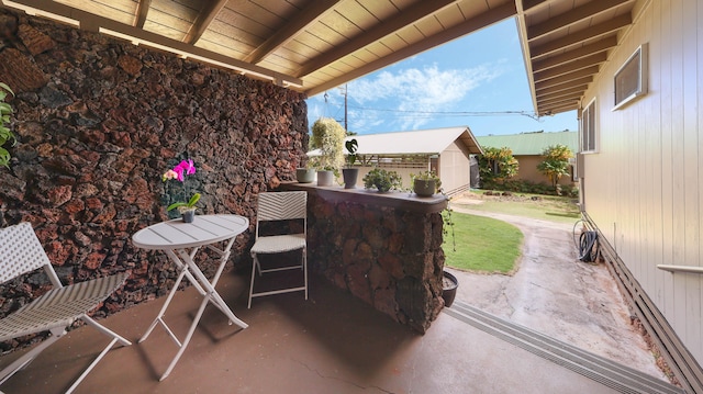3189 Hikina Rd, Koloa, HI 96756 - view of patio / terrace with an outbuilding