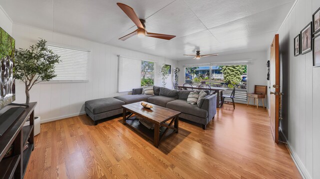 3189 Hikina Rd, Koloa, HI 96756 - living room featuring light wood-style floors and a ceiling fan
